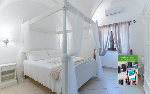 Masseria Lamagrotte: Interior Design, Furniture, Ceiling, Floor, Flooring, Bed, Bedroom, Lighting, Room, Resort