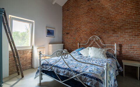 Villa Poggio Zucchino, Pool, Wellness, Piacenza: Wall, Bedroom, Furniture, Brick, Bed, Interior Design, Bed Sheet, Bedding, Bed Frame, Brickwork