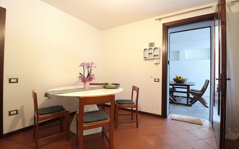 Villa Rosa Apartment: Interior Design, Flooring, Furniture, Wood, Floor, Ceiling, Kitchen & Dining Room Table, Table, Dining Room, Lighting