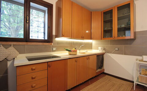 Villa Rosa Apartment: Countertop, Cabinetry, Kitchen, Wood, Flooring, Interior Design, Kitchen Sink, Kitchen Appliance, Sink, Cupboard