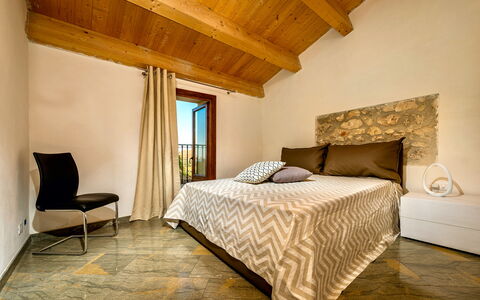 Villa La Musa: Furniture, Interior Design, Bed, Flooring, Floor, Bedroom, Wall, Wood, Room, Ceiling