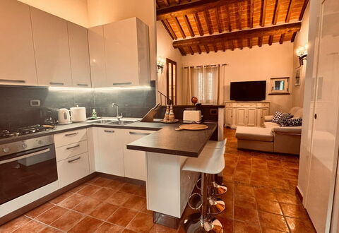 Casa Castelli: Furniture, Interior Design, Flooring, Countertop, Wood, Kitchen, Floor, Ceiling, Cabinetry, Kitchen Appliance