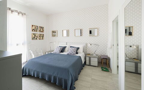 Timo: Interior Design, Flooring, Floor, Furniture, Wall, Bedroom, Ceiling, Wood, Room, Bed