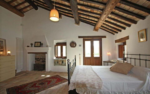 Villa la Dolcevita: Furniture, Wall, Interior Design, Wood, Ceiling, Room, Bed, Flooring, Bedroom, Picture Frame