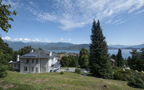 Alina Villa: Tree, House, Home, Mountain, Hill, Landscape, Residential Area, Highland, Roof, Mountain Range