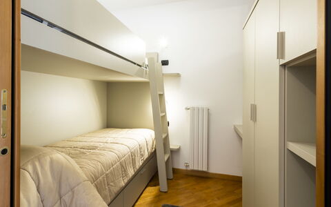 Baita Bucaneve: Bedroom, Bed, Interior Design, Flooring, Floor, Wood, Bed Sheet, Bedding, Ceiling, Furniture