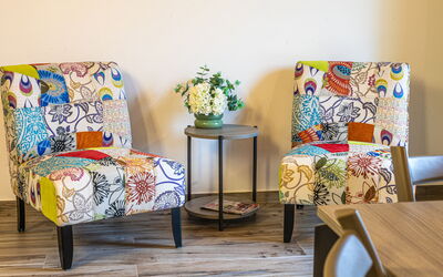 Villa Zena: Furniture, Interior Design, Yellow, Flooring, Floor, Textile, Chair, Brown, Living Room, Orange