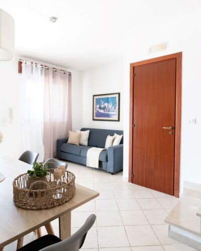 Villa Vitalis: Flooring, Interior Design, Floor, Home, Furniture, Door, Apartment, Room, Chair, Living Room