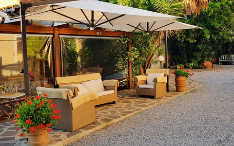 Appartamento Girasole Seaside and Pool: Furniture, Flowerpot, Outdoor Furniture, Shade, Umbrella, Chair, Outdoor Table, Garden, Outdoor Structure