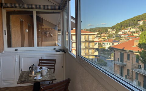 La Casa di Viviana Terrace, Close to the Beach: Apartment, Balcony, Glass, Chair, Wood Stain, Daylighting, Hardwood, Aluminium