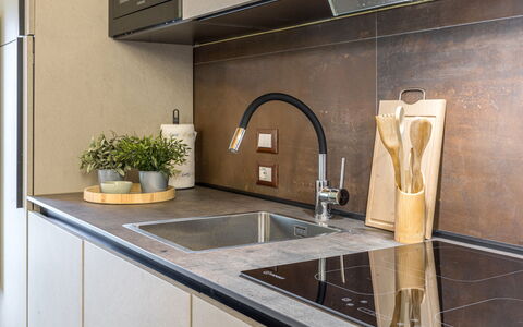 Zena Suite: Countertop, Kitchen, Kitchen Sink, Wood, Flooring, Interior Design, Plumbing Fixture, Tap, Cabinetry, Kitchen Appliance