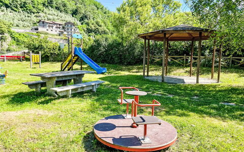 Erika: Public Space, Outdoor Play Equipment, Park, Garden, Shade, Lawn, Landscaping, Yard, Playground, Outdoor Furniture