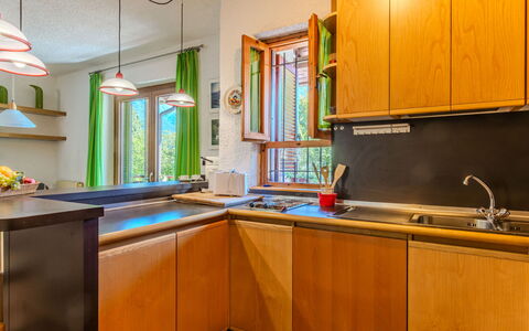 Erika: Kitchen, Countertop, Interior Design, Wood, Ceiling, Kitchen Appliance, Major Appliance, Room, Cabinetry, Flooring