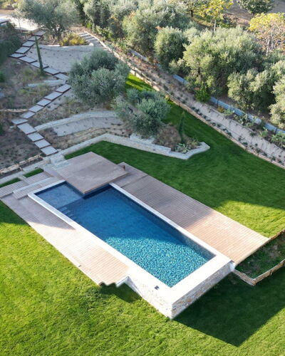 Villa Carciofa: Garden, Shrub, Swimming Pool, Landscaping, Backyard, Estate, Lawn, Yard, Villa, Courtyard