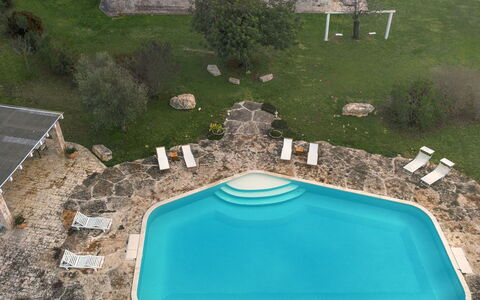 Trulli Experience, Pool, Monopoli: Swimming Pool, Leisure, Recreation, Vacation, Outdoor Furniture, Resort, Flagstone, Villa, Hacienda, Water Feature