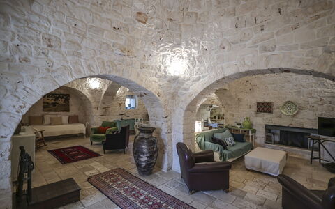 Trulli Experience, Pool, Monopoli: Wall, Furniture, Flooring, Ceiling, Interior Design, Floor, Lighting, Couch, Room, Living Room