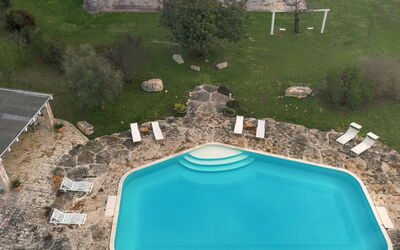 Trulli Experience, Pool, Monopoli: Swimming Pool, Leisure, Recreation, Vacation, Outdoor Furniture, Resort, Flagstone, Villa, Hacienda, Water Feature