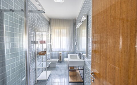 Mestrina Apartment: Flooring, Interior Design, Floor, Plumbing Fixture, Ceiling, Lighting, Tile, Composite Material, Plumbing, Bathroom