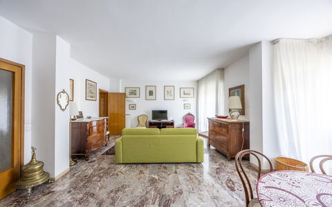 Mestrina Apartment: Flooring, Floor, Interior Design, Ceiling, Room, Home, Furniture, Apartment, Living Room, Carpet