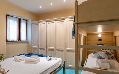 Suite la Torre: Bed, Furniture, Interior Design, Bedroom, Wood, Room, Floor, Flooring, Ceiling, Textile