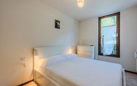 Pinzolo 205: Interior Design, Bed, Bedroom, Flooring, Floor, Wood, Room, Ceiling, Bed Sheet, Bedding