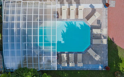 Besanina: Blue, Swimming Pool, Leisure, Outdoor Furniture, Resort, Composite Material, Shade, Eco Hotel, Chair, Umbrella