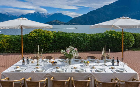 Besanina: Furniture, Table, Restaurant, Chair, Tablecloth, Sea, Mountain Range, Centrepiece, Rehearsal Dinner