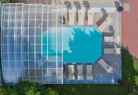 Besanina: Blue, Swimming Pool, Leisure, Outdoor Furniture, Resort, Composite Material, Shade, Eco Hotel, Chair, Umbrella