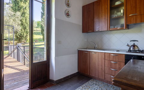 Podere le Lune with Pool, San Gimignano: Wood, Flooring, Wood Stain, Hardwood, Kitchen, Countertop, Cabinetry, Kitchen & Dining Room Table, Varnish, Tile