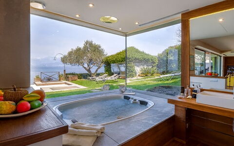 Isa Villa: Furniture, Interior Design, Resort, Plumbing Fixture, Bathtub, Chair, Swimming Pool, Ceiling, Houseplant