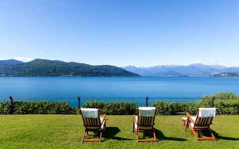 Isa Villa: Blue, Water, Body Of Water, Mountainous Landforms, Natural Landscape, Mountain, Hill, Coastal And Oceanic Landforms, Mountain Range, Sea