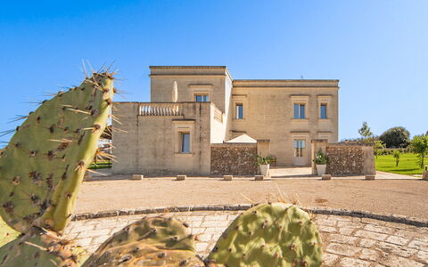 Masseria Ficalindia: Sky, Facade, Architecture, Home, Estate, Mansion, Villa, Landscaping, Driveway