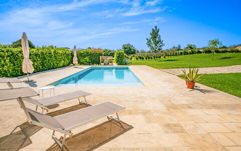 Masseria Ficalindia: Swimming Pool, Outdoor Furniture, Flagstone, Resort, Composite Material, Garden, Shade, Landscaping, Tile, Eco Hotel