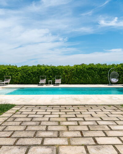 Masseria Ficalindia: Blue, Swimming Pool, Garden, Composite Material, Outdoor Furniture, Leisure, Resort, Landscaping, Shade, Water Feature