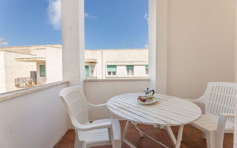 Appartamento Smeraldo, Gallipoli: Apartment, Furniture, Floor, Balcony, Chair, Outdoor Furniture, Coffee Table, Hotel, Daylighting