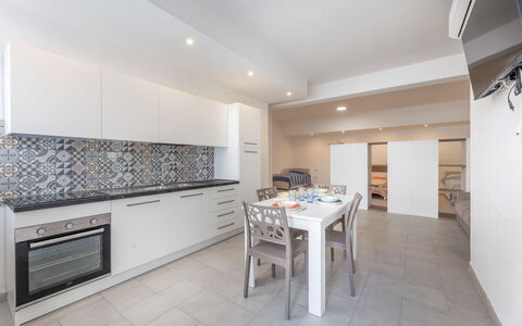 Appartamento Monomare, Gallipoli: Flooring, Floor, Interior Design, Ceiling, Kitchen, Room, Countertop, Major Appliance, Apartment, Tile