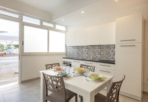 Appartamento Monomare, Gallipoli: Flooring, Interior Design, Floor, Furniture, Kitchen, Countertop, Major Appliance, Ceiling, Apartment, Room