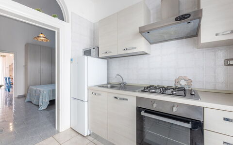 Casa Marinella, Marina di Mancaversa: Flooring, Major Appliance, Kitchen, Floor, Kitchen Appliance, Interior Design, Countertop, Cabinetry, Furniture, Apartment
