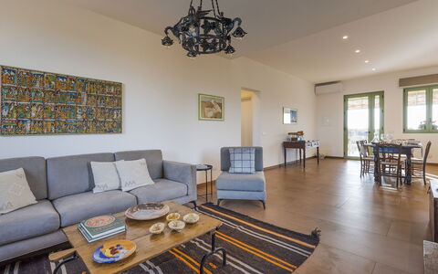 Mami: Furniture, Flooring, Interior Design, Floor, Wood, Couch, Ceiling, Room, Table, Living Room