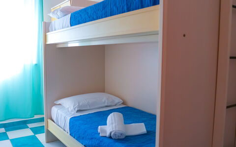 Residence Villarosa Pool and Beach: Bedroom, Floor, Interior Design, Bed Sheet, Bed, Furniture, Bedding, Flooring, Bed Frame, Room