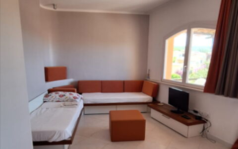 Rocciarossa: Furniture, Flooring, Floor, Interior Design, Couch, Living Room, Room, Apartment, Television