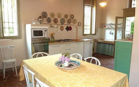 Villa Castellani: Furniture, Interior Design, Flooring, Wood, Table, Kitchen, Floor, Room, Kitchen & Dining Room Table, Kitchen Appliance