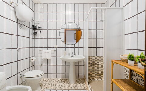 Stella Marina: Interior Design, Flooring, Toilet Seat, Bathroom, Floor, Plumbing Fixture, Toilet, Plumbing, Tile, Ceiling