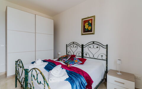 Stella Marina: Bed, Furniture, Bedroom, Interior Design, Bed Sheet, Bedding, Flooring, Floor, Room, Linens