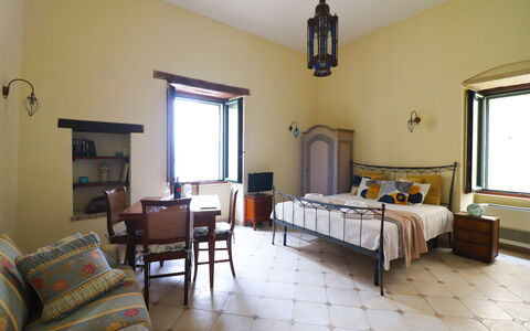 Scilla Centro Storico Otranto: Furniture, Interior Design, Wall, Bedroom, Bed, Flooring, Floor, Ceiling, Room, Lighting