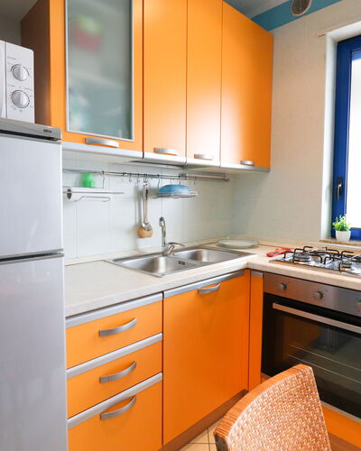 Circe Sea View: Kitchen, Kitchen Appliance, Major Appliance, Countertop, Wood, Kitchen Sink, Kitchen Stove, Cabinetry, Stove, Interior Design