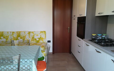 Villa Maddalena: Flooring, Interior Design, Floor, Wood, Kitchen, Major Appliance, Furniture, Room, Kitchen Appliance, Countertop