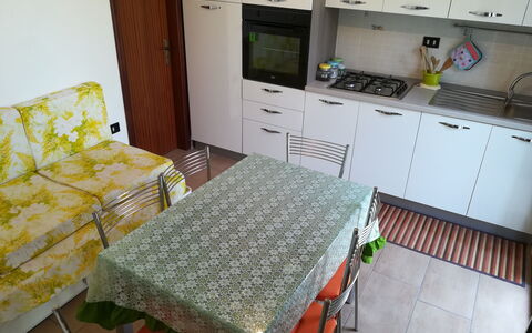 Villa Maddalena: Flooring, Interior Design, Furniture, Floor, Wood, Room, Kitchen, Apartment, Kitchen Appliance, Major Appliance