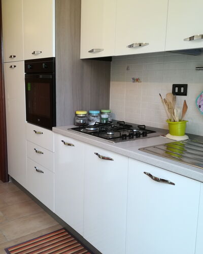 Villa Maddalena: Kitchen, Major Appliance, Kitchen Appliance, Countertop, Stove, Kitchen Stove, Flooring, Cabinetry, Home Appliance, Gas Stove