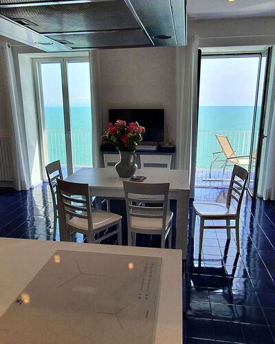 Casa Blue Dream: Furniture, Floor, Sea, Chair, Ocean, Coffee Table, Resort, Hotel, Outdoor Furniture